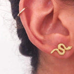 Guldfarvede slange øreringe med rhinsten