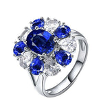 Blomster ring med blå sten