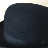 Mørkeblå bowlerhat