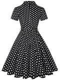 Mørkeblå polkaprikket rockabilly-kjole