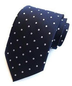 Mørkeblåt slips med hvide prikker